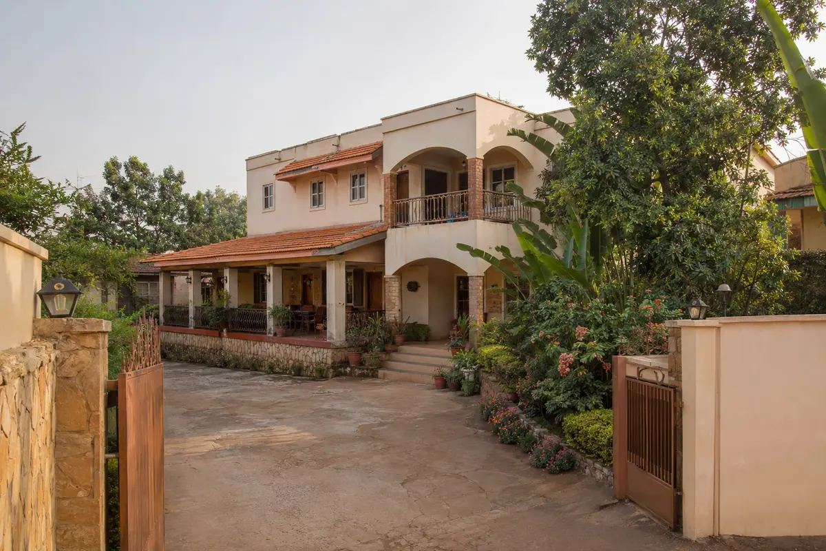 Fictional guest house courtyard